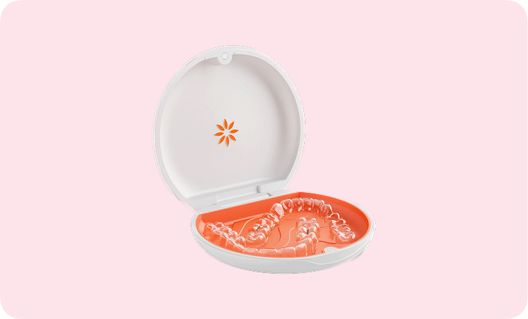 Set of Vivera® Retainers in an orange and white case