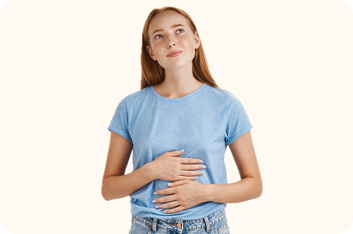 Comtemplative Teen Girl With Hands Over Stomach