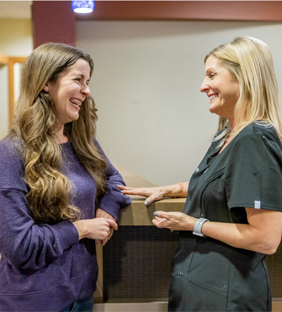Smiling Joy Of Orthodontics Patient With Technician
